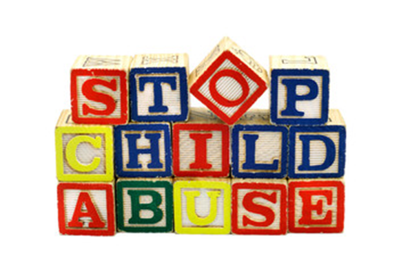 toy blocks spelling 'stop child abuse'